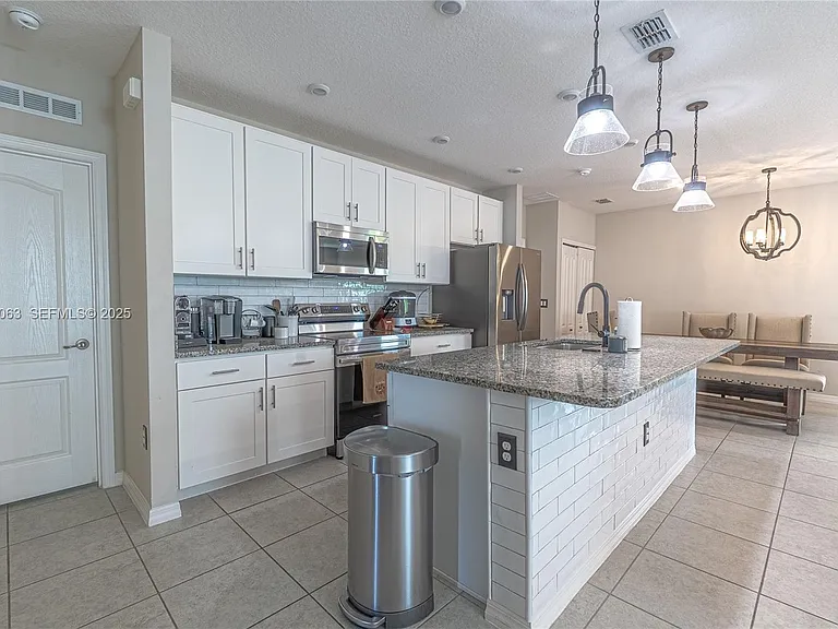 10609 SW Vasari Way — Photo 4