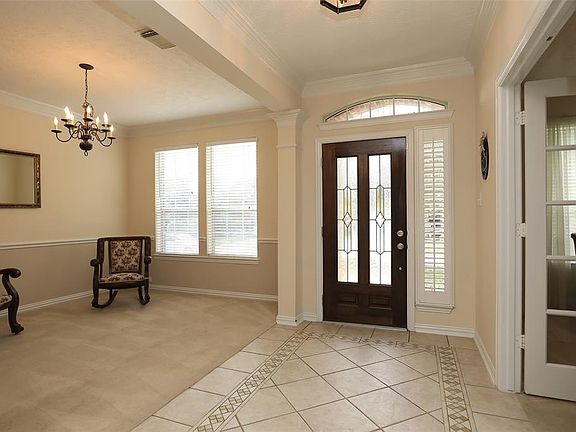 As you walk into the foyer, formal dining room on your right and study on the left.