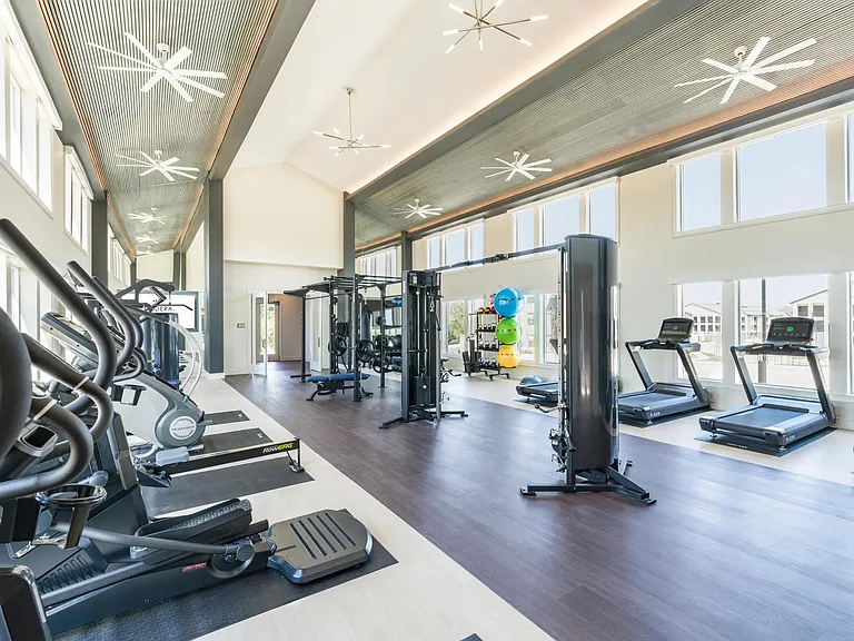 Premium Fitness Studio featuring cardio equipment, free-weights, state of the art equipment, including boxing zone and spin bikes.
