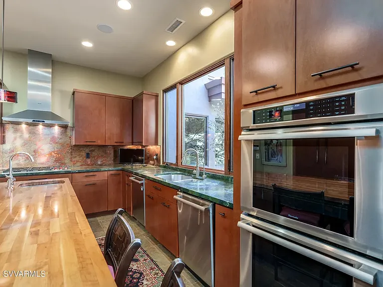 Upper Kitchen with Double Dishwashers and Double Ovens