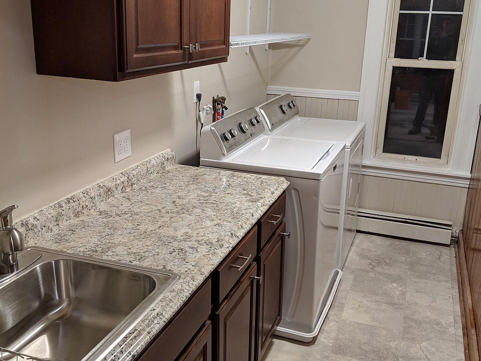 Newly renovated kitchen with in unit washer & dryer
