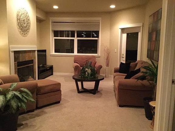 Living room with Tiger Mountain views and deck access