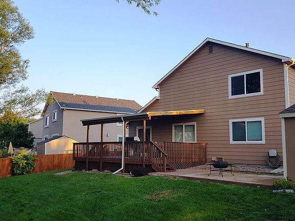 Rear yard with covered deck.