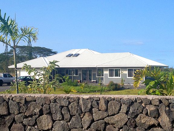 Four foot rock wall, providing plenty of privacy.