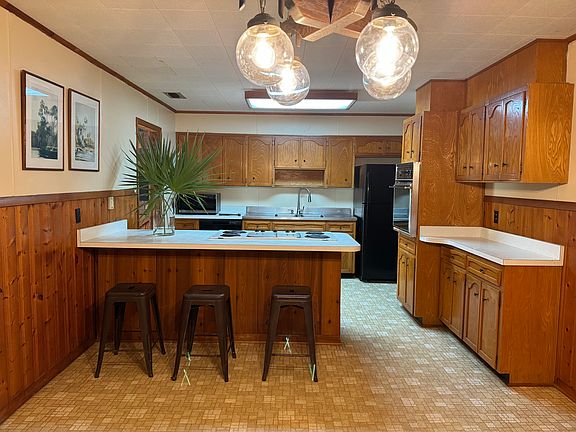 View from Dining to kitchen and breakfast bar