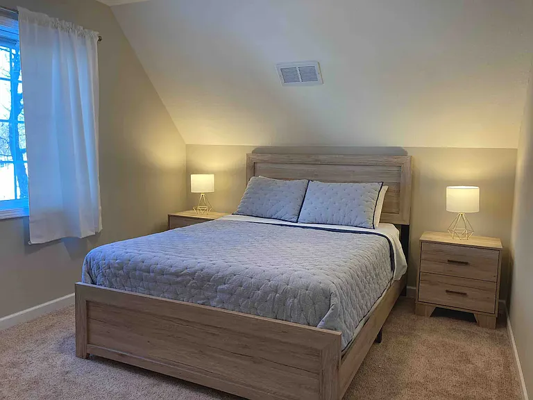Bedroom 1. home does not come furnished. furnishing is for visual reference only.