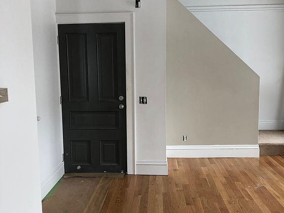 Entrance and stairwell leading to open loft