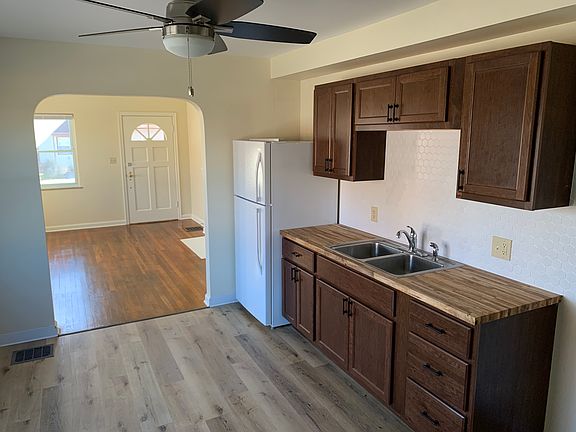 Kitchen looking into living room