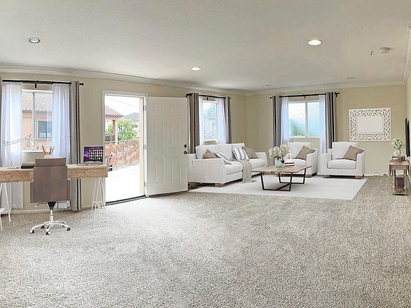 Expansive living room and office space.