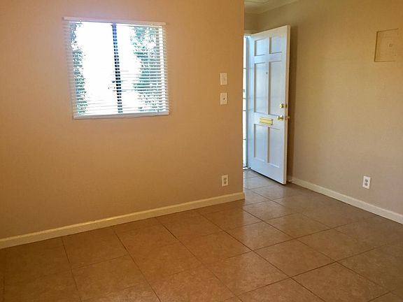 Entry with cool, easy to maintain tile throughout