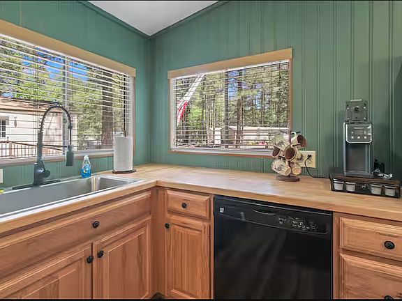 Enjoy cooking family meals in this space! Enjoy breakfast looking outside the nature view.