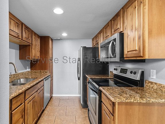 5th image of 2938 N 61st Pl Unit 108