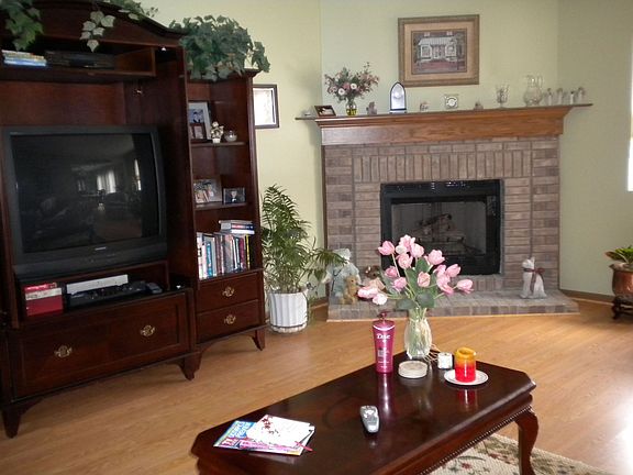 Pergo floors & Fireplace in Living Room