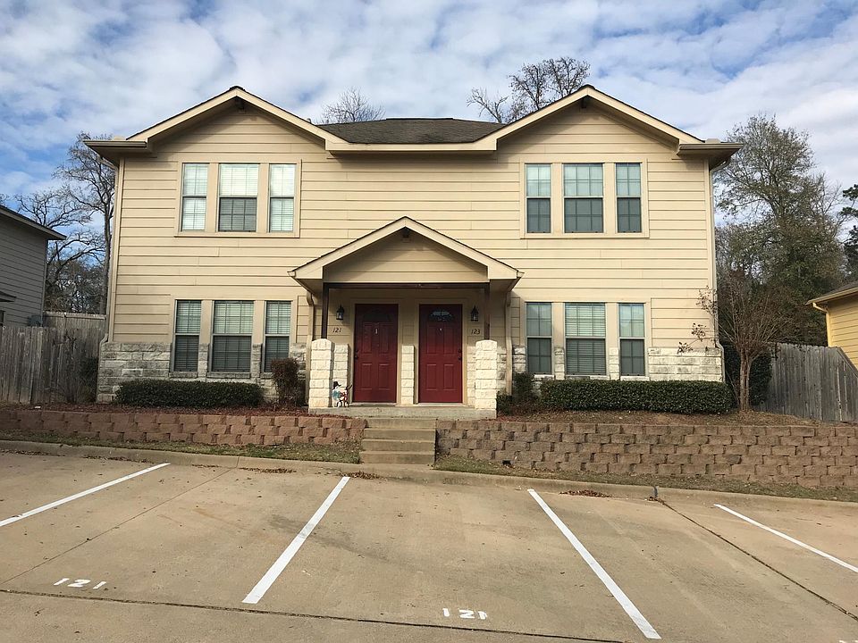 Front of the Duplex. Three Designated parking spaces for each unit. Visitor Parking spaces available.