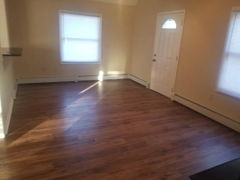 Den and side door entrance