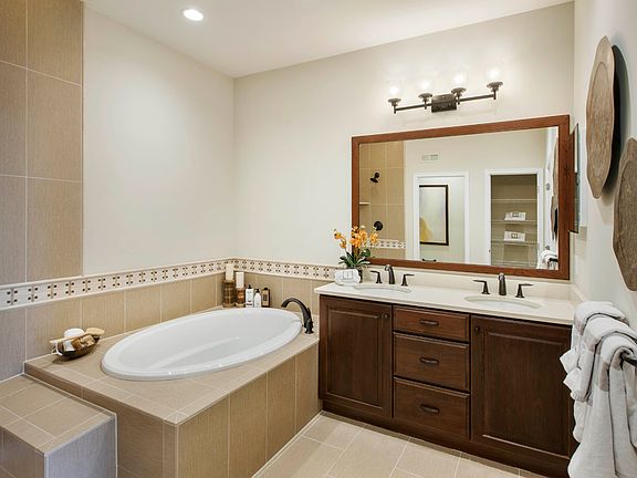 Spa-like primary bath with dual-sink vanity