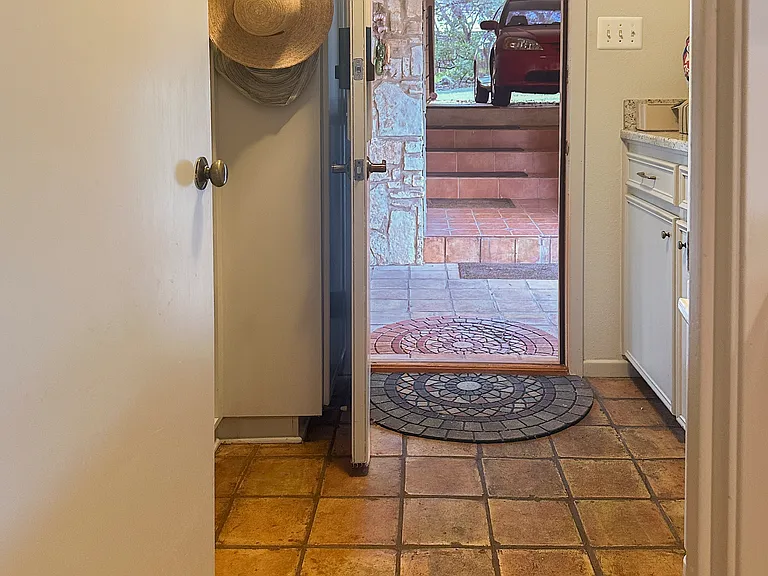 Mudroom leading to carport.