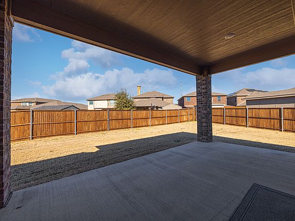 Large covered patio and huge backyard. Lawn Maintenance is included.