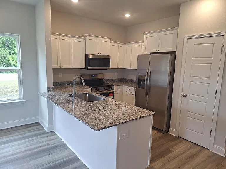 The Island Townhomes, LLC — Photo 6