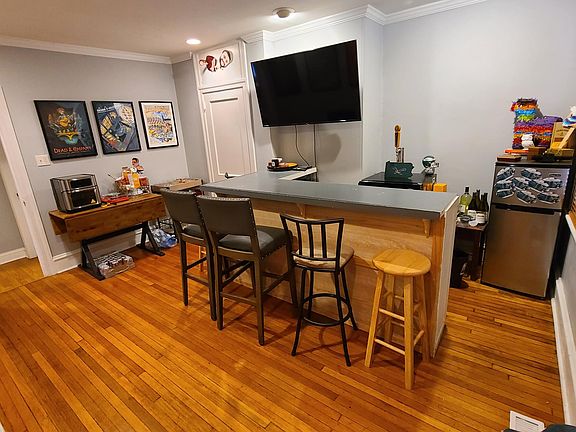 Additional living space comes with a built in bar area