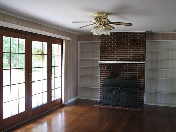 Great Room with French doors, fireplace and bookcases!