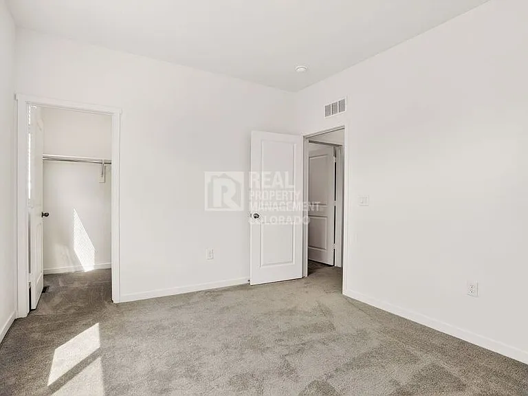 14591 W 91st Ln #C — Photo 35