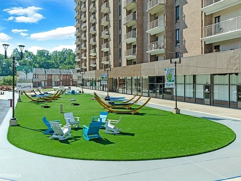 Relax in the plaza - bistro seating and hammocks galore