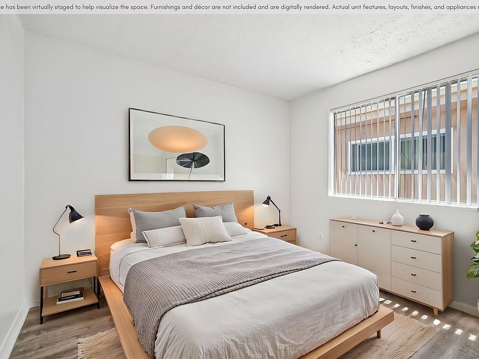 Spacious bedroom with a bright, comfortable layout and natural light.