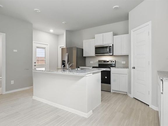 Kitchen - All Home and community information, including pricing, included features, terms, availability and amenities, are subject to change at any time without notice or obligation. All Drawings, pictures, photographs, video, square footages, floor plans, elevations, features, colors and sizes are approximate for illustration purposes only and will vary from the homes as built.