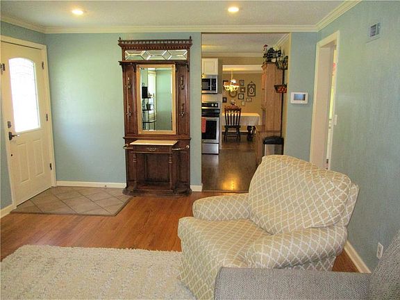 Plus the living room has an open view and is easily accessible to the kitchen and dining room.