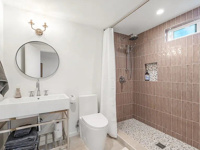 Refresh and unwind in this clean, comfortable bathroom