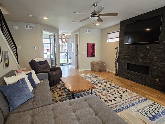 Living Room - Gas Fireplace, 65" TV, In Ceiling Speakers, Fan