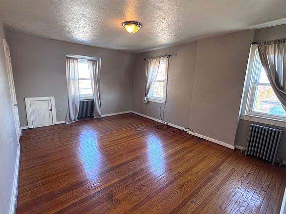 Spacious Living room with genuine hardwood floors