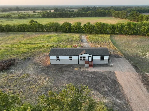 696 County Road 4040, Ector, TX 75439
