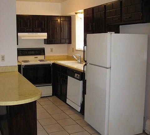 Kitchen with self cleaning oven, dishwasher