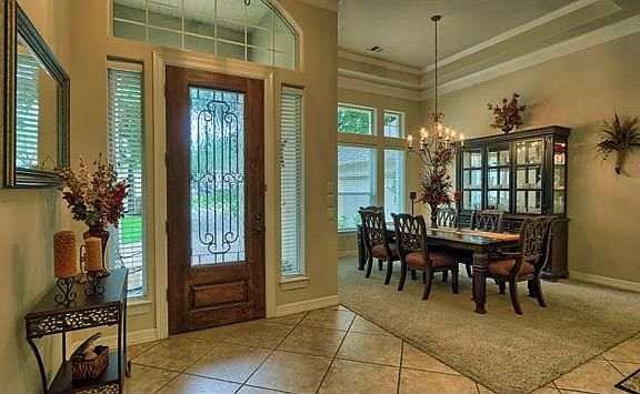 view from foyer to formal dining  area
