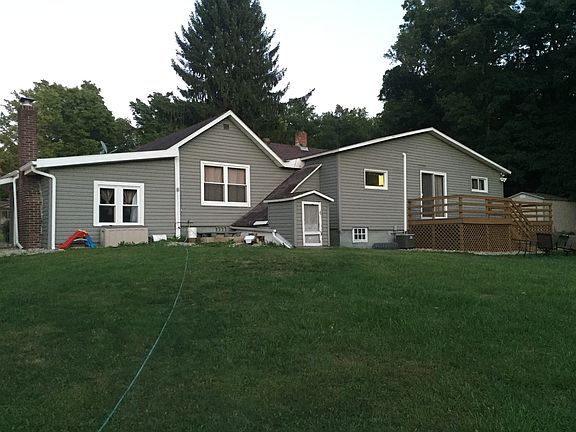 Rear view w/ wrapped porch