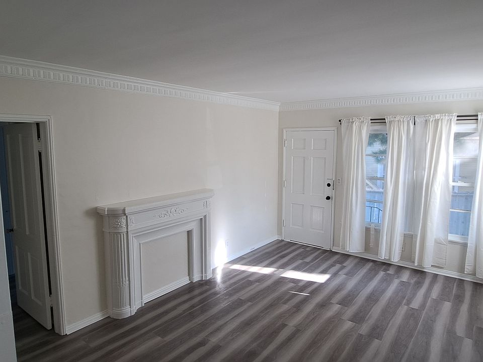 living room with faux Fireplace 18'x12' square feet