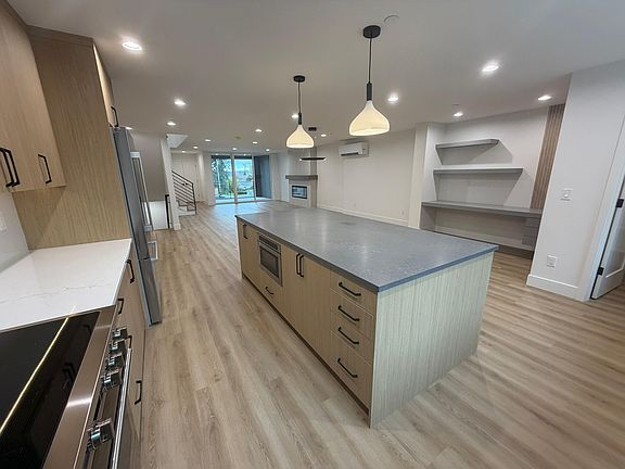 Kitchen looking towards dining and family area
