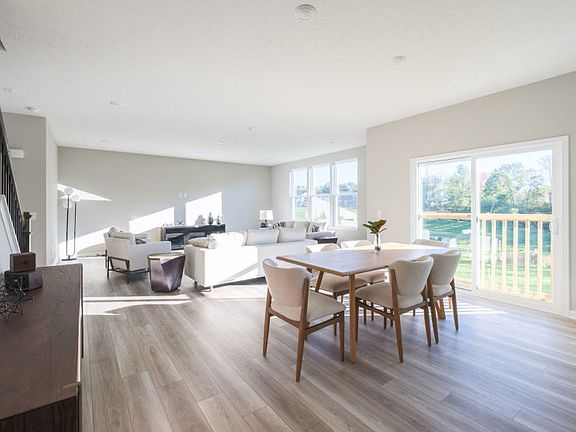 Open Concept Design Featuring Gathering Room, Kitchen and Cafe