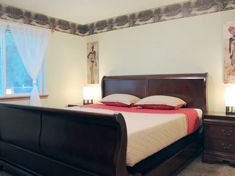 Primary bedroom with walk-in closet on main floor