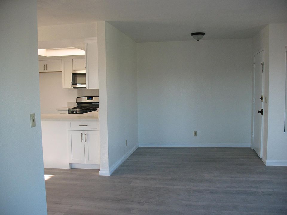 A view of the entry way from the living room
