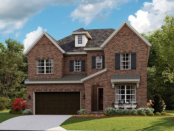 Coronado B - English Cottage 2-Car Front Load Garage Note Renderings may show optional features