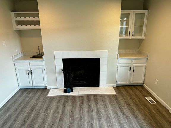Freshly painted cabinets. Brand new countertop finish. Brand new flooring, baseboards. Freshly painted walls and ceiling.