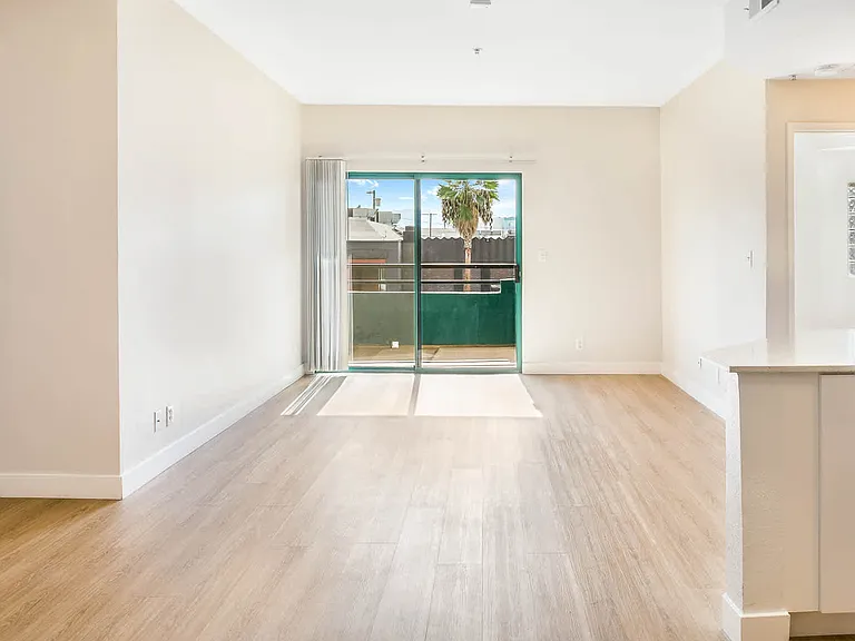 Living Room with Hard Surface Flooring and Balcony