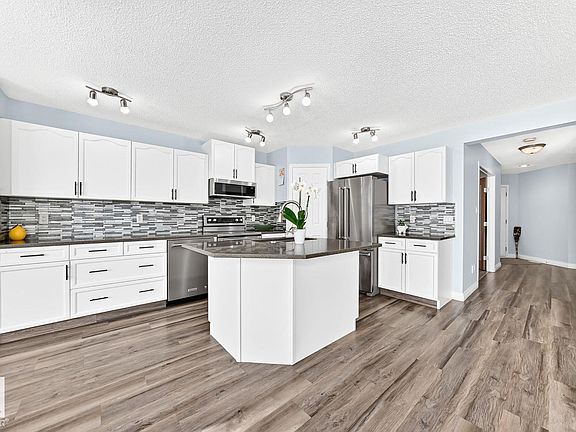 4th image of 6936 Strom Ln NW