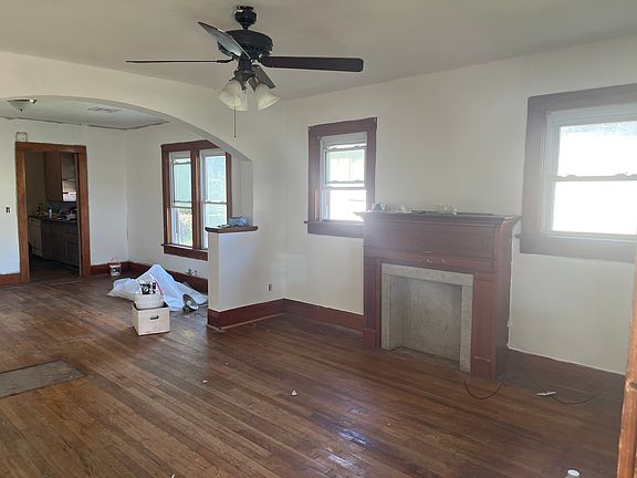 Living room with faux fireplice
