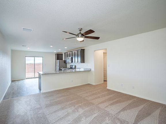 Open-concept living area attached to the kitchen.