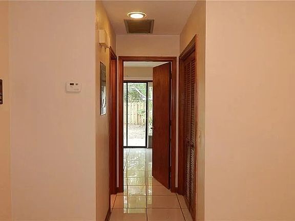 Downstairs hallway to the bedroom and bathroom