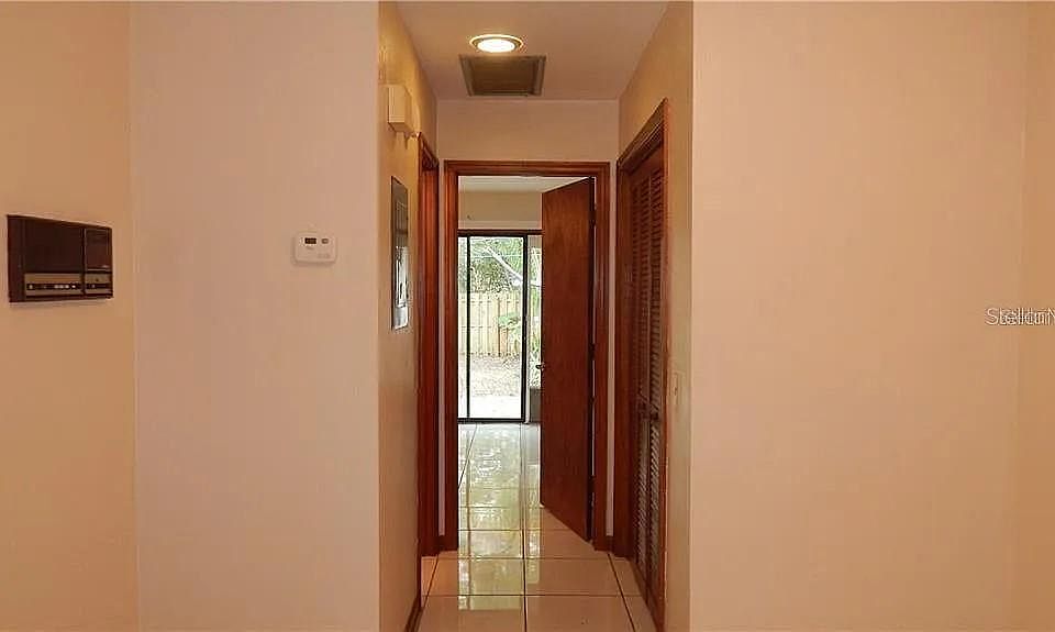 Downstairs hallway to the bedroom and bathroom